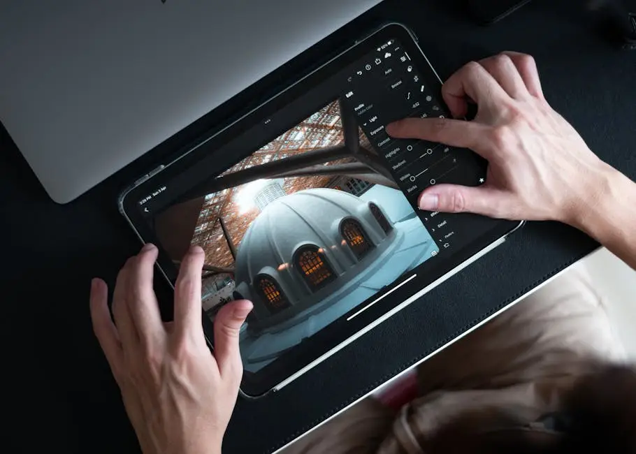 Hands editing architectural photo on tablet using Lightroom app.