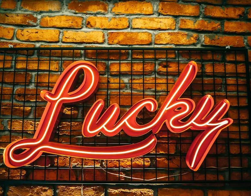 Bright neon 'Lucky' sign mounted on a rustic brick wall in Istanbul, Turkey.