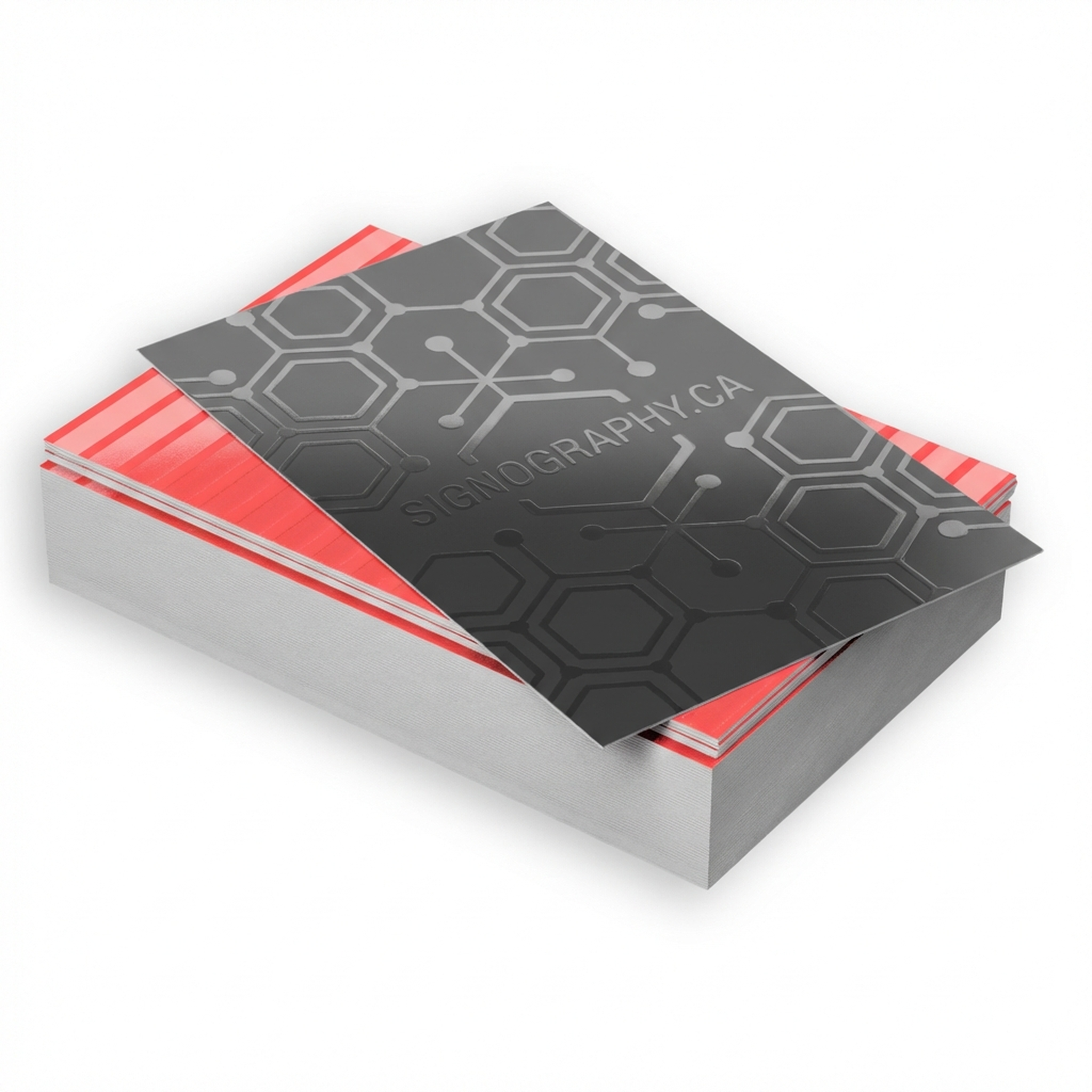 Stack of matte laminated business cards with spot UV gloss